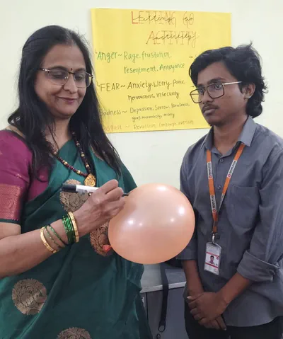 Students participating in the Dhruti PEERS activity 2